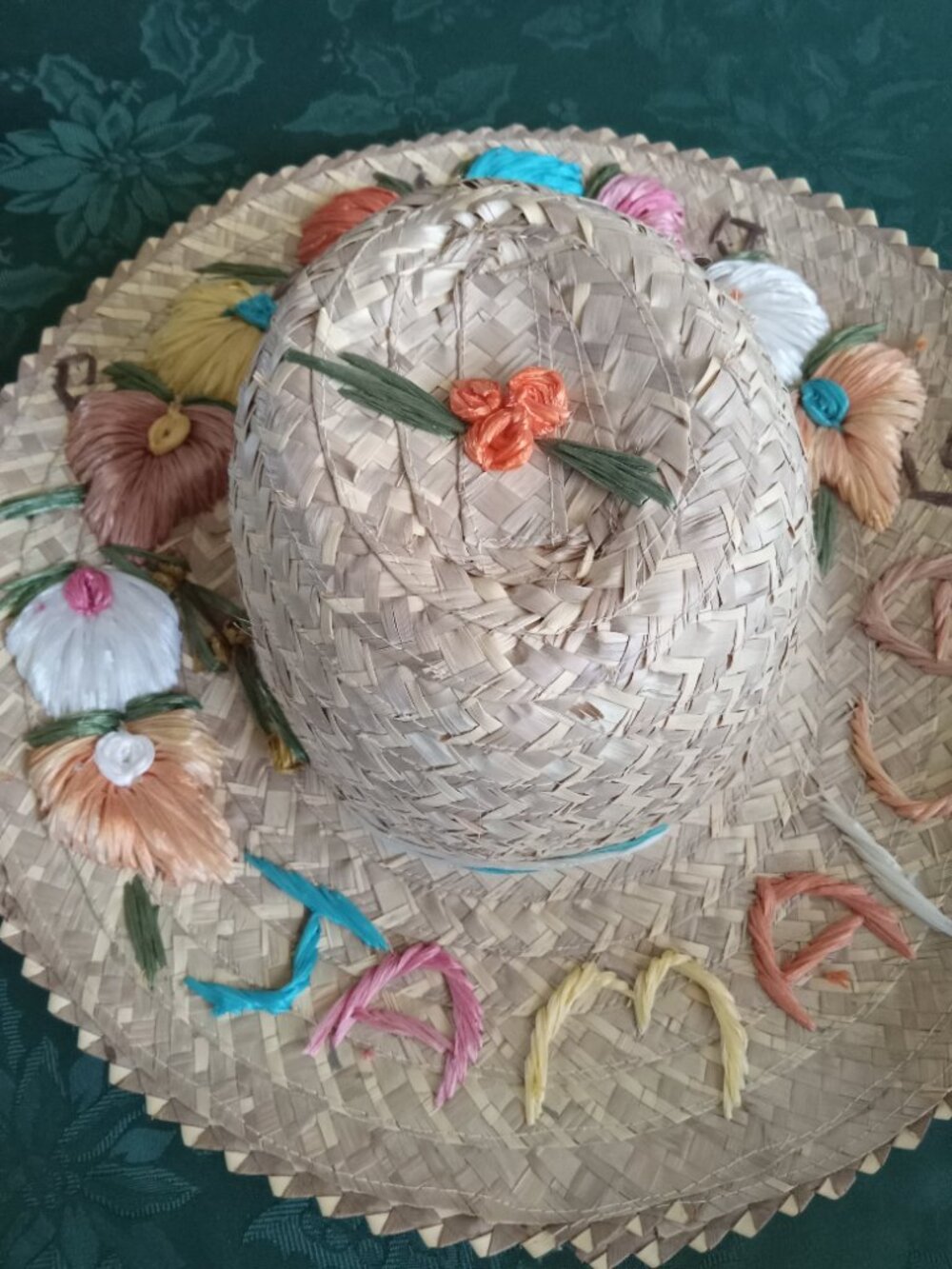 Colourfully embroidered straw Jamaica hat with chin string